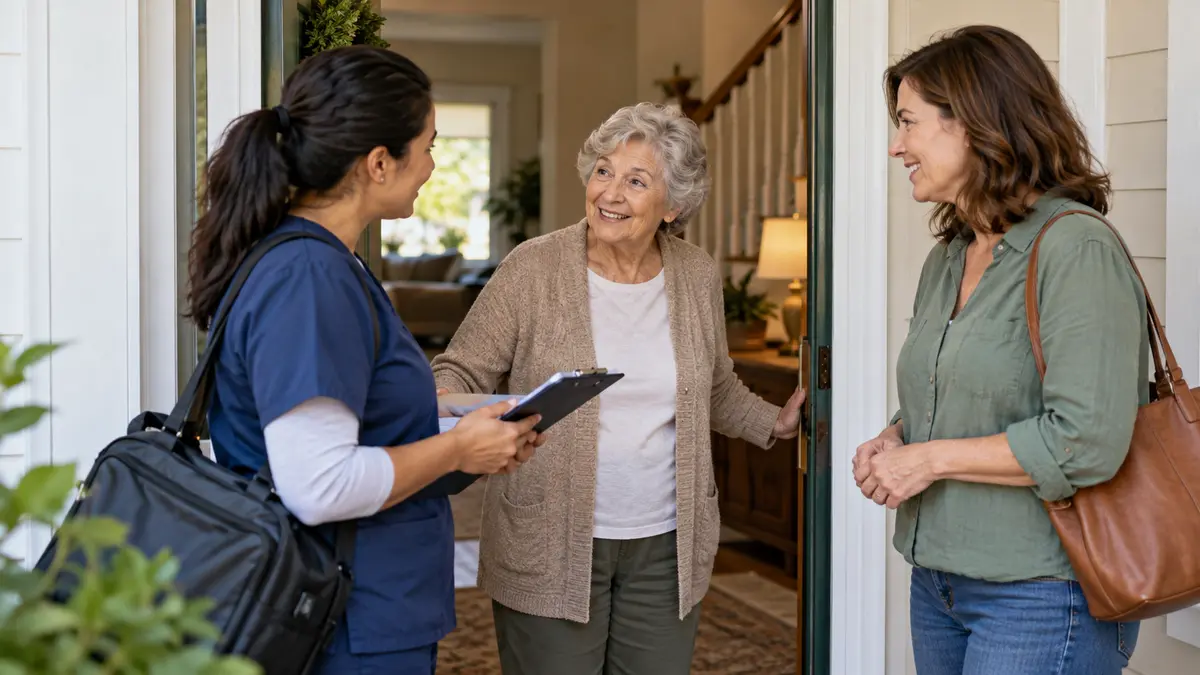 An older adult and home-health professional discuss home health under Medicare advantage prior authorization during a home-health visit.
